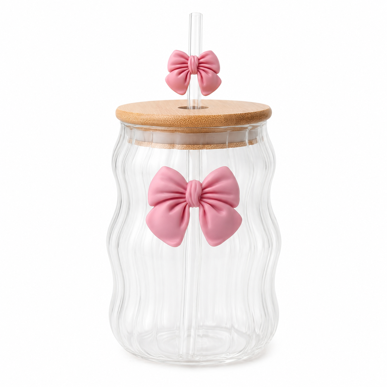 Vaso de vidrio ondulado con moño 3D de silicona rosa, tapa de bambú y popote de vidrio con moñito